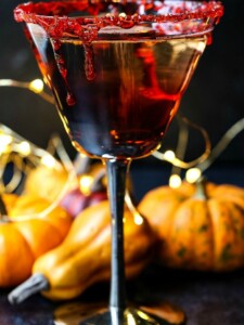 Vampire's Kiss Martini with fake blood dripping down the sides of the glass