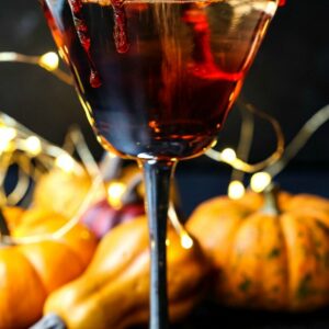 Vampire's Kiss Martini with fake blood dripping down the sides of the glass
