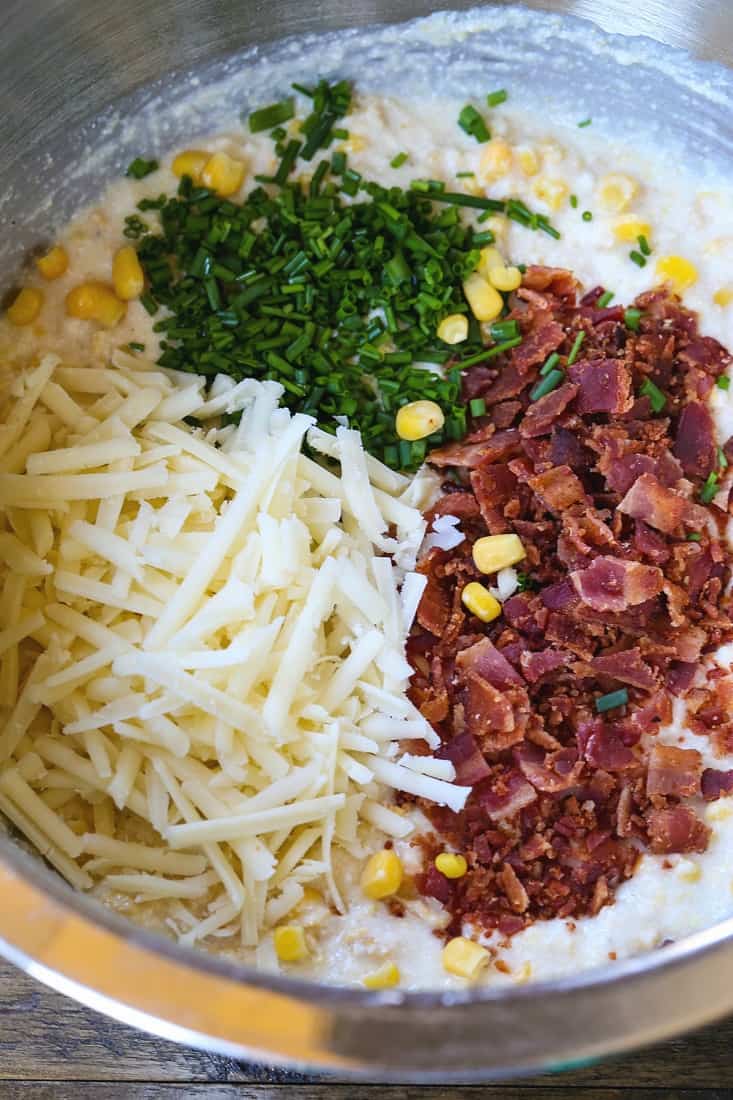 Ingredients in a bowl for Bacon Corn Spoon bread