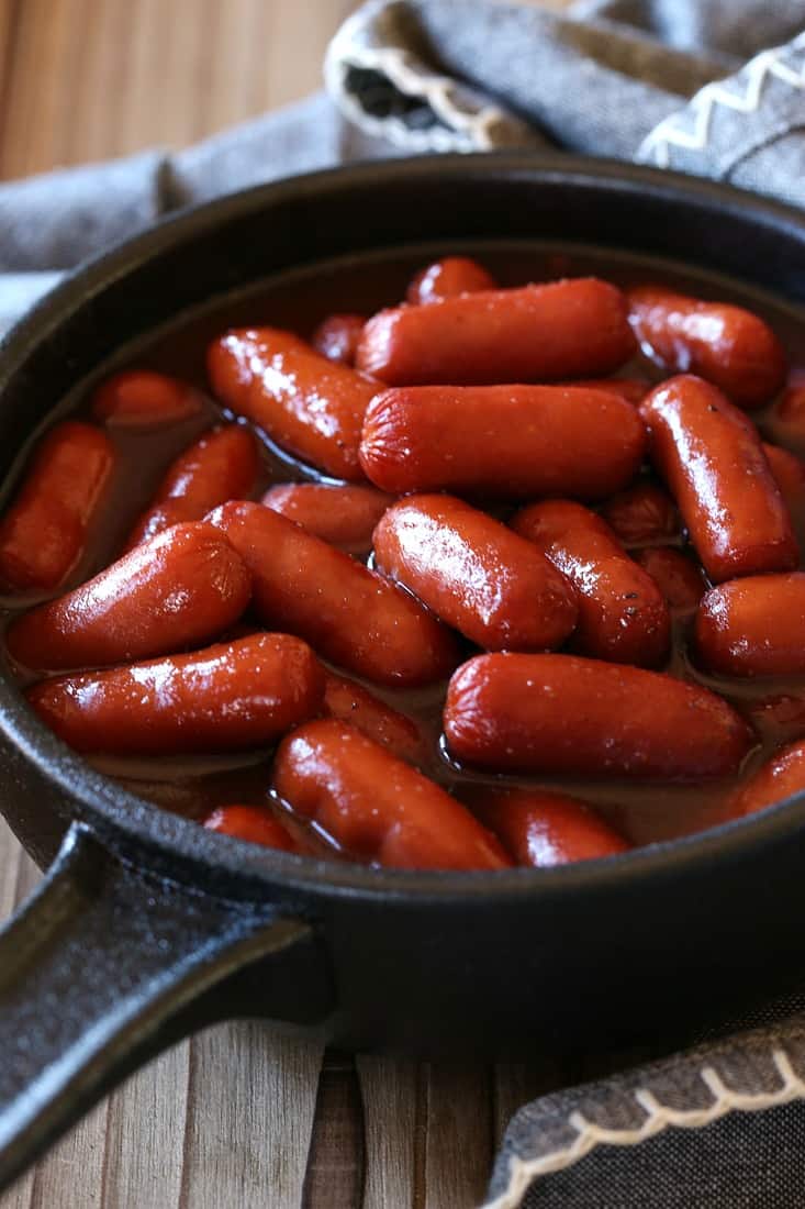 Little Smokies in a cast iron skillet for serving