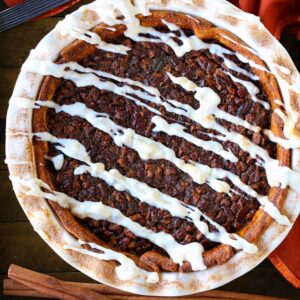 Cinnamon Roll Pie from the top with napkin and pie server