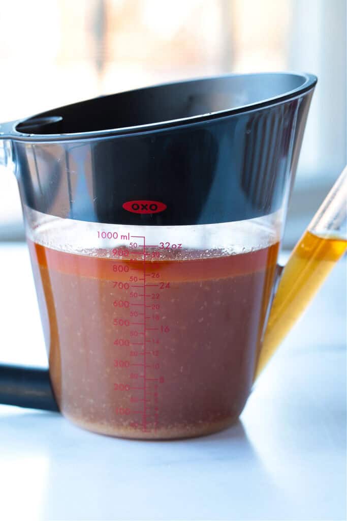 You're going to want to pour this Cranberry Turkey Gravy on everything! Cranberry sauce and bourbon add so much flavor than regular gravy! gravy separator with drippings