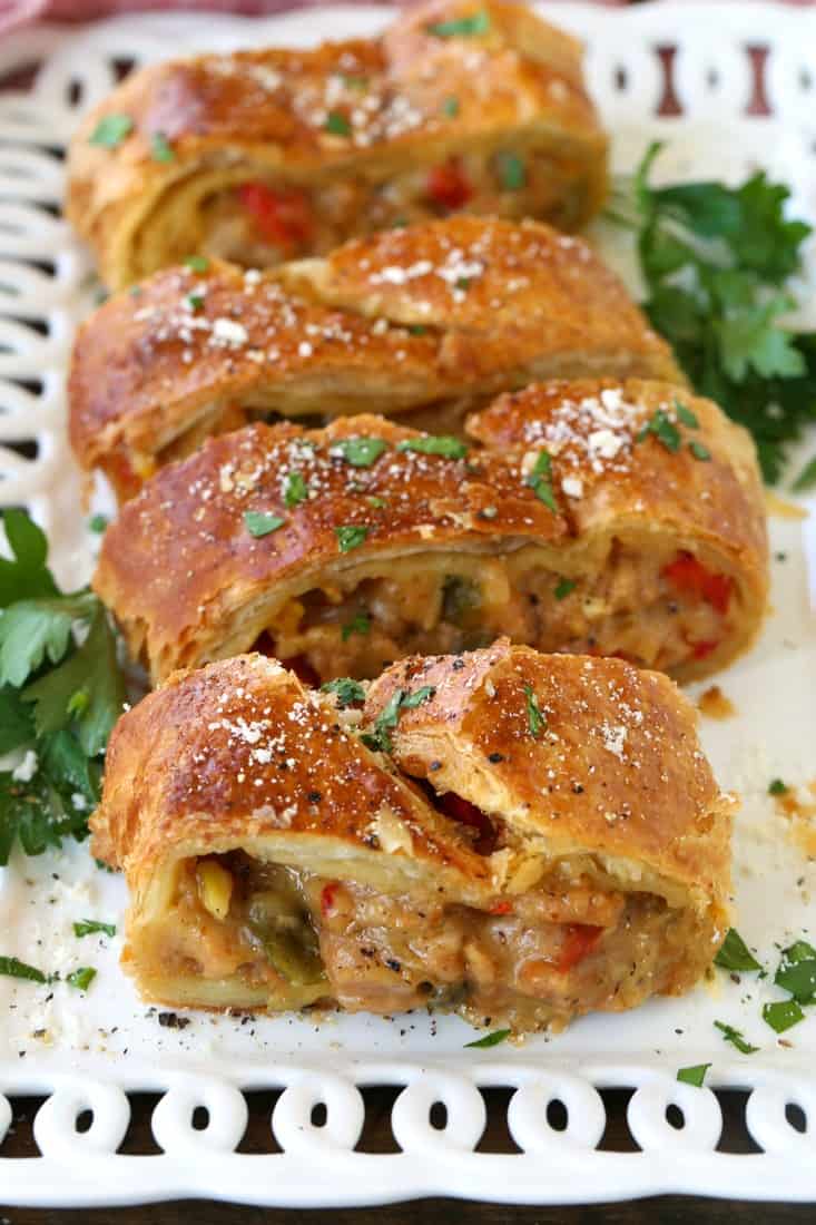 Sausage strudel sliced on a serving platter