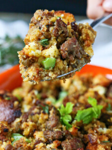 sausage cornbread dressing on serving spoon