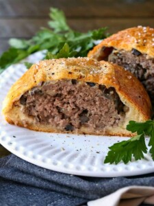 ground beef wellington sliced in half