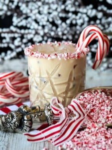 creamy drink recipe with candy canes as garnish