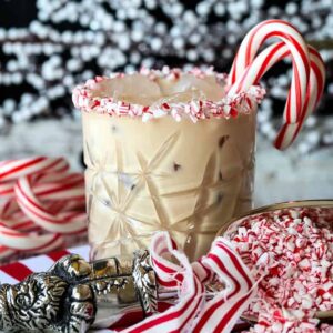 creamy drink recipe with candy canes as garnish