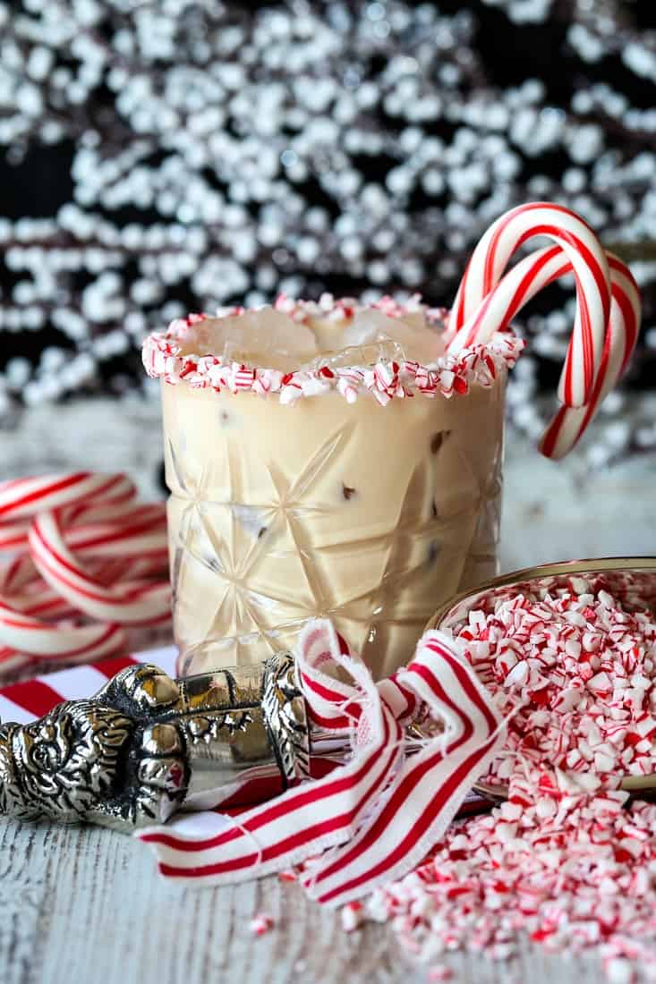creamy drink recipe with candy canes as garnish