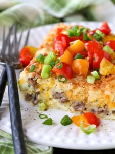 sausage breakfast casserole on plate with forks