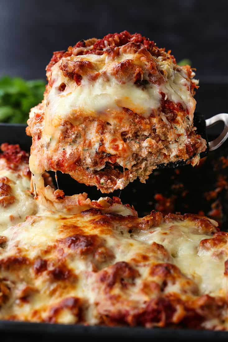Slice of eggplant parmesan on spatula