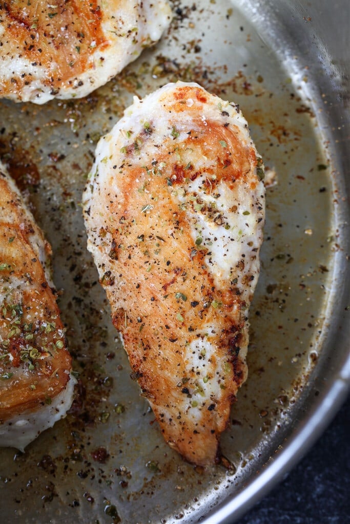seared chicken breasts in a skillet