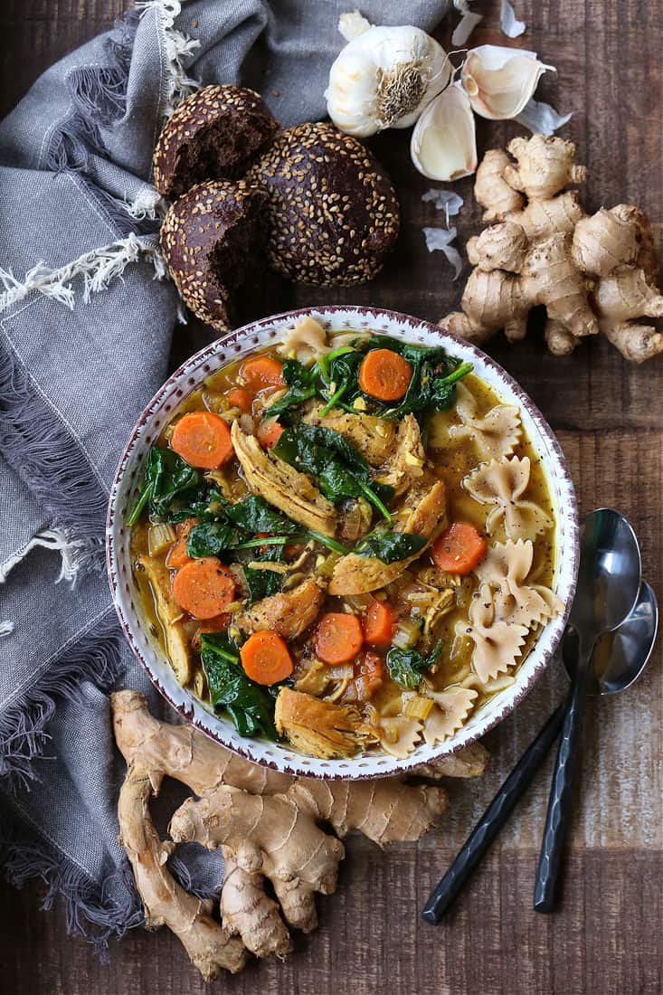 Chicken Soup in a bowl with vegetables and whole wheat pasta