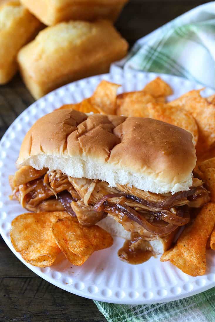 Hawaiian Pulled Chicken sandwich on a plate with chips