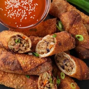 Homemade pork egg rolls on a platter