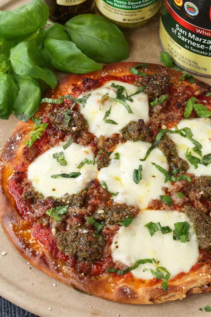 Sausage pizza recipe made with basil pesto