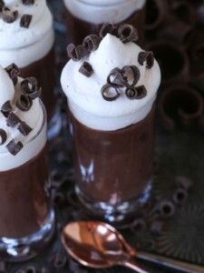 Chocolate pudding shots with whipped cream on top
