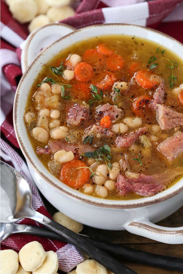 Soup recipe in white bowl with oyster crackers