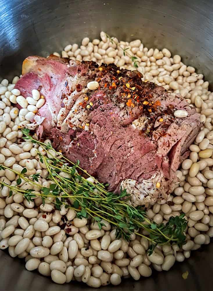 Ham bone in a pot with beans for soup recipe