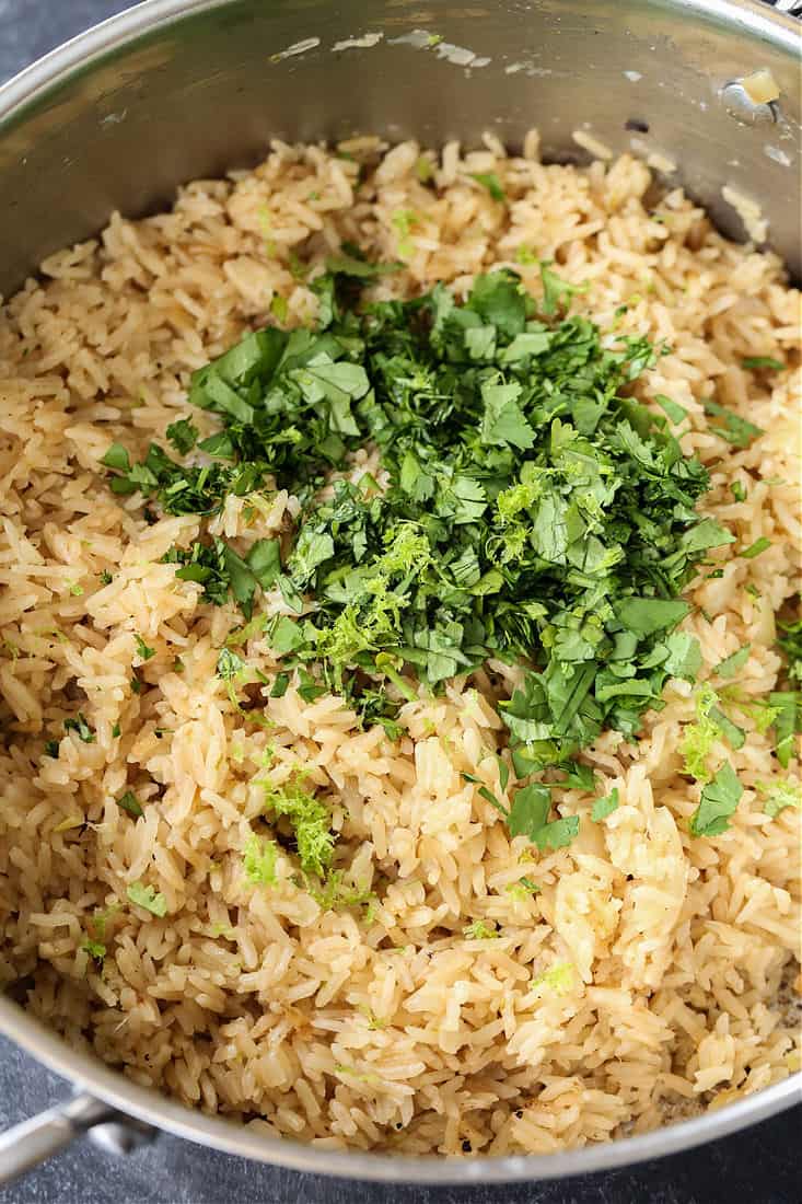 Rice recipe with fresh cilantro in a pot