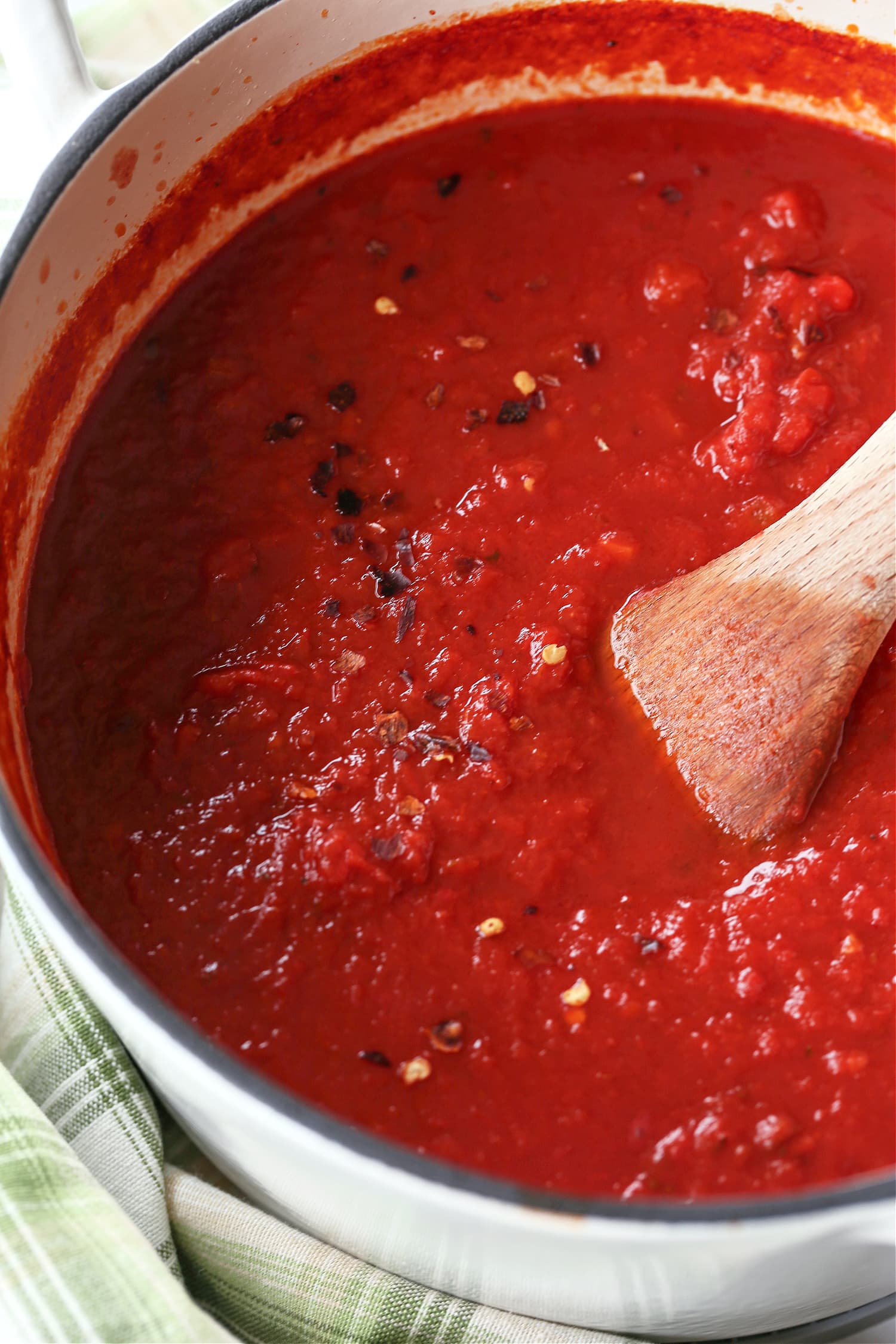 pot with spoon in arrabbiata sauce