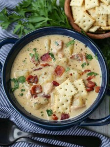 Clam chowder in a bowl with crackers