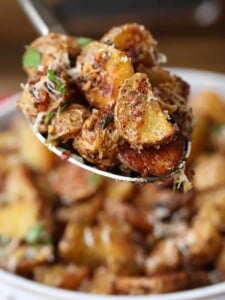 Garlic Parmesan potatoes on a spoon