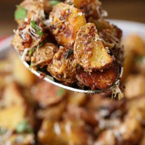 Garlic Parmesan potatoes on a spoon