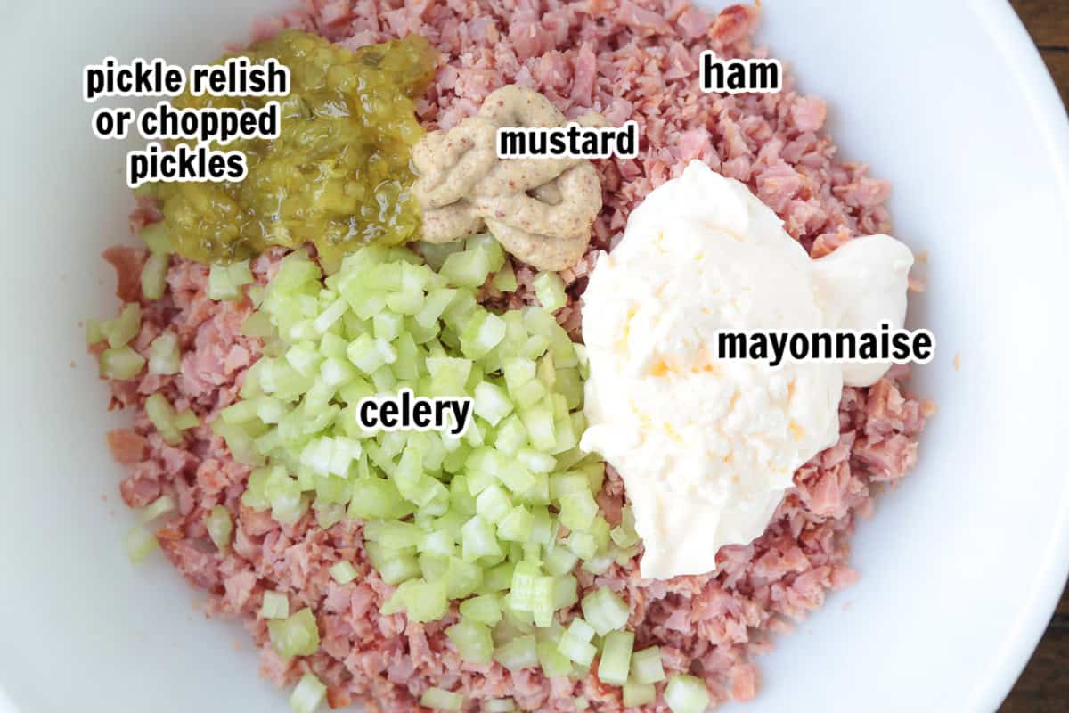 Our Ham salad recipe is the perfect way to use up leftover ham! Creamy and tangy, it’s great for sandwiches, wraps, or served with crackers. ingredients for ham salad