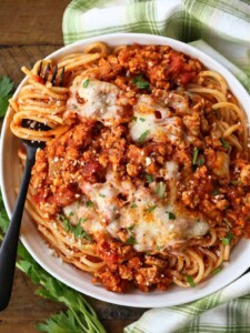 Ground chicken recipe served over spaghetti