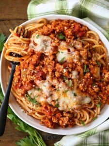 Ground chicken recipe served over spaghetti