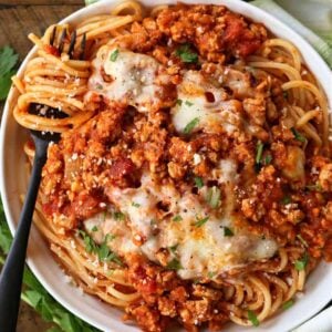 Ground chicken recipe served over spaghetti