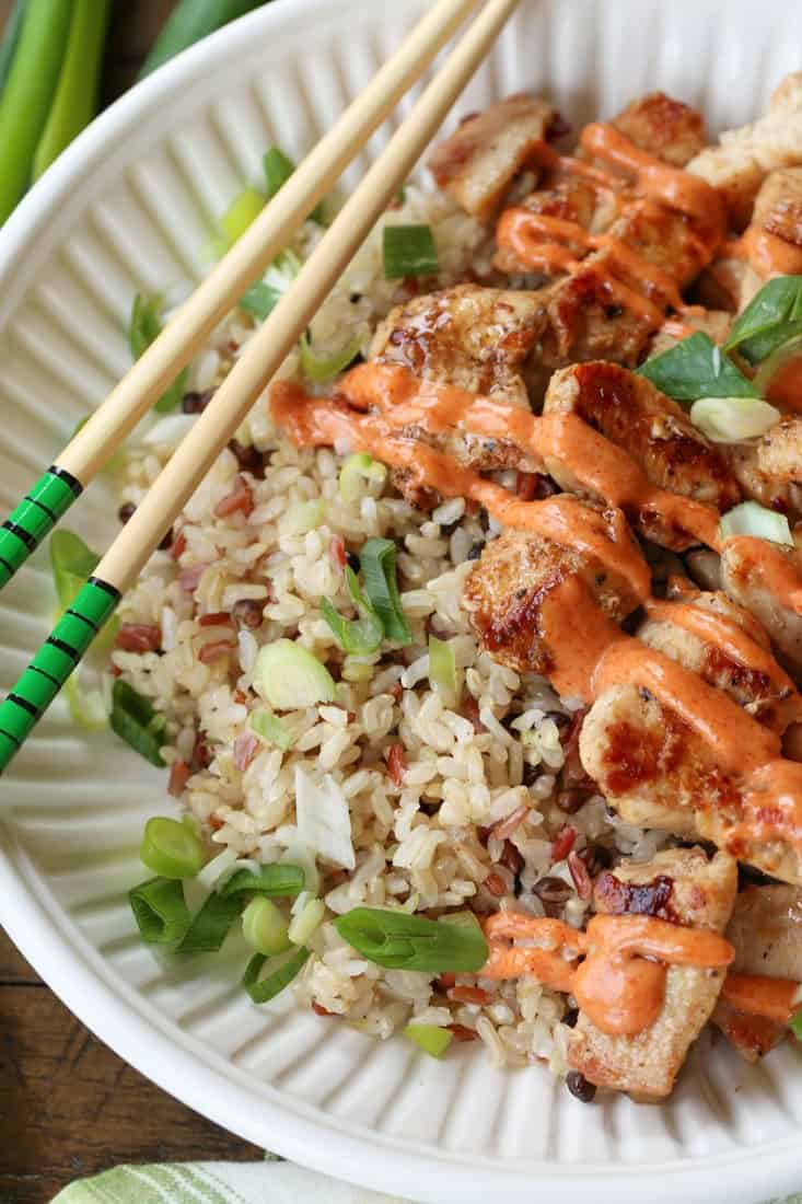 Hibachi Chicken in a bowl with yum yum sauce