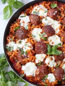 Meatballs and mozzarella cheese with baked pasta