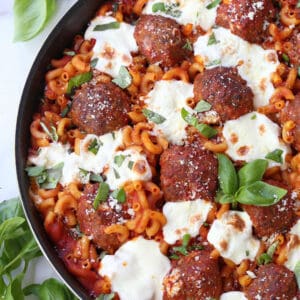 Meatballs and mozzarella cheese with baked pasta