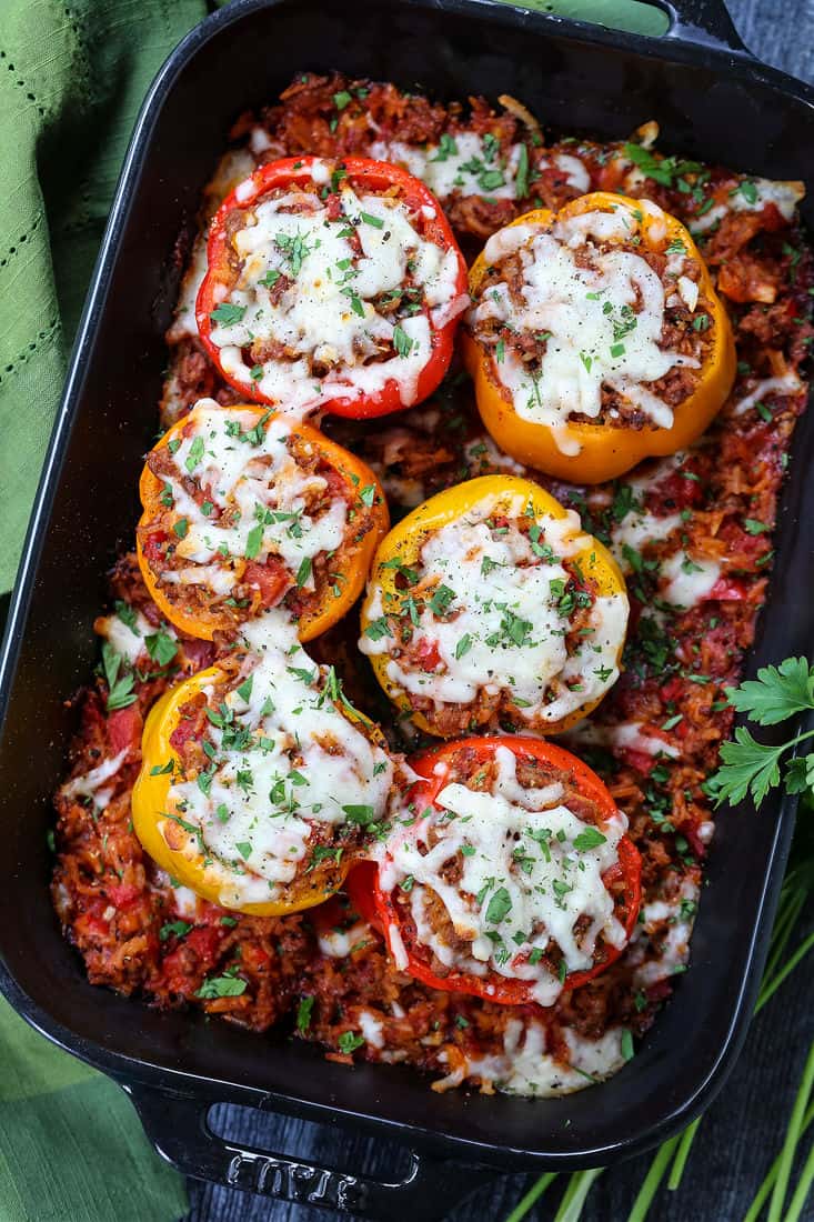 Stuffed peppers recipe in a black baking dish