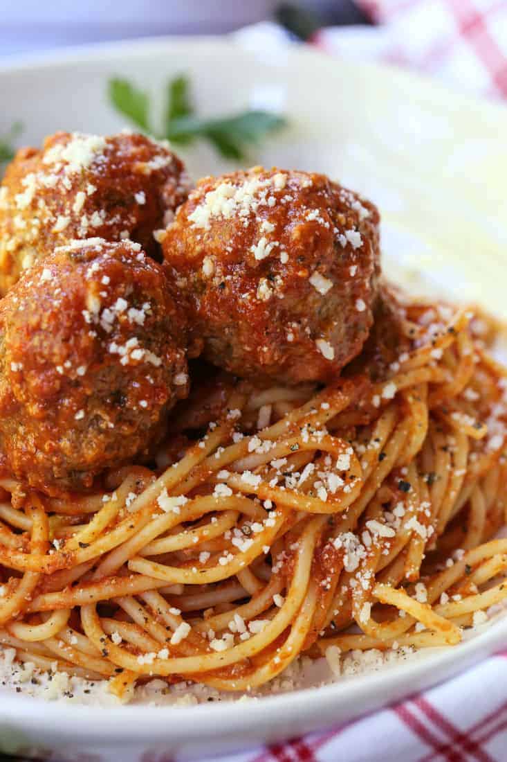 Slow Cooker meatballs on top of spaghetti