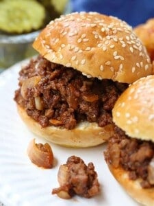 Sloppy Joe sliders on a plate with tater tots