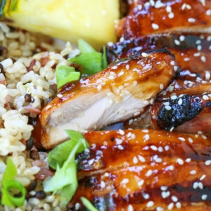 grilled teriyaki chicken sliced on plate