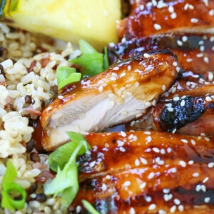 grilled teriyaki chicken sliced on plate