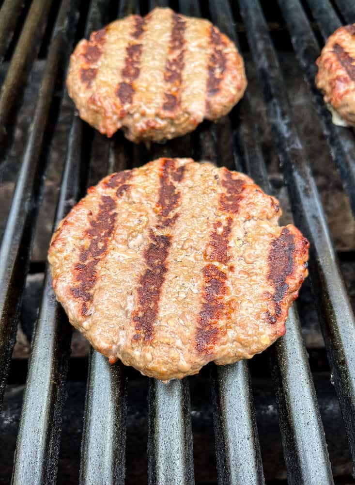 Hamburger patties on a grill
