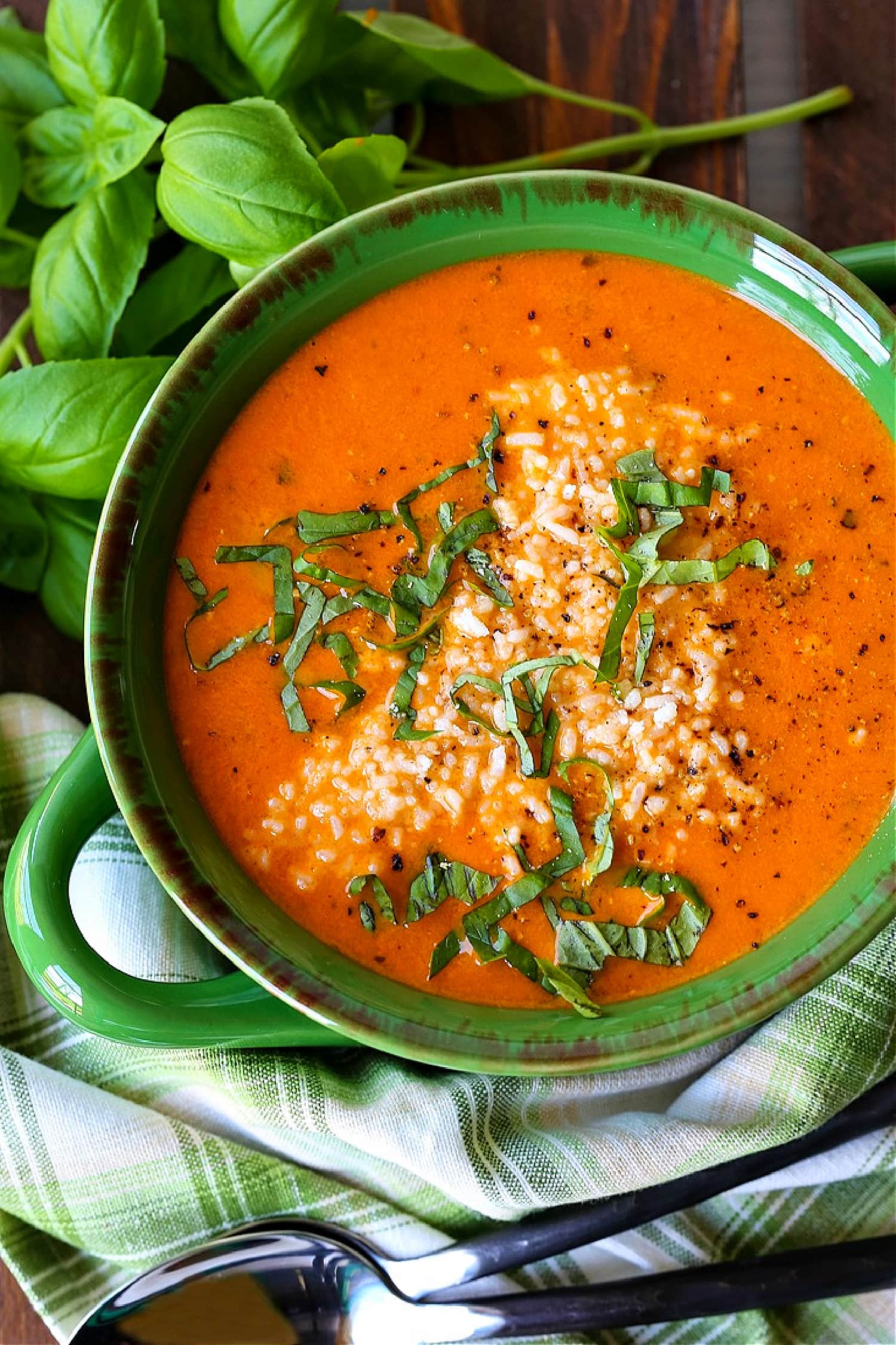 tomato basil soup in green bowl