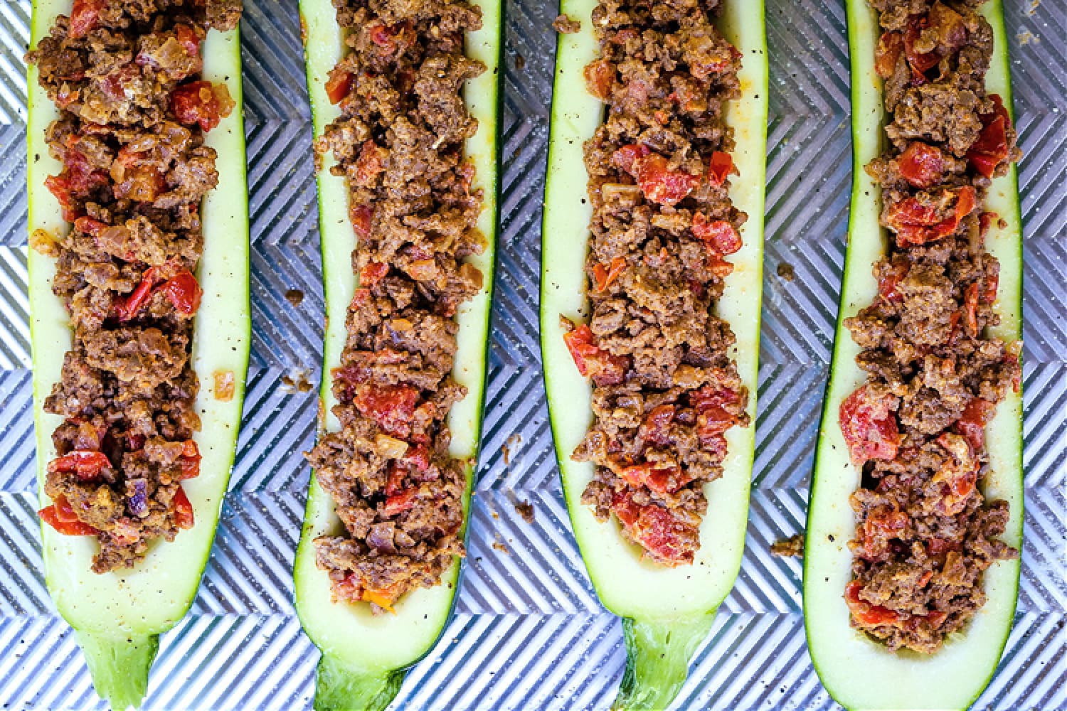 zucchini boats filled with a ground beef filling