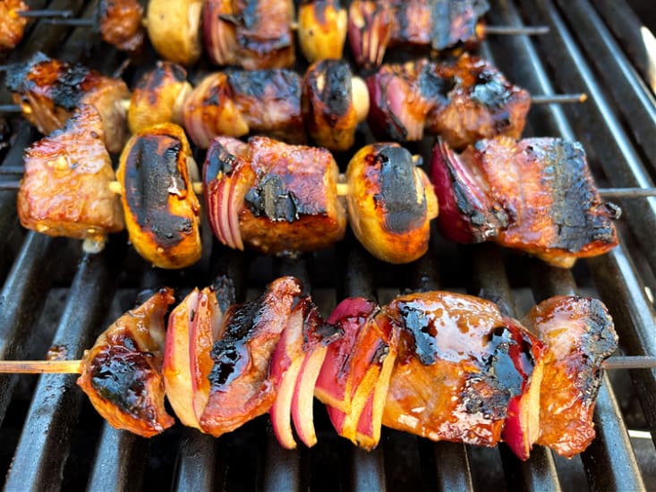 Steak and vegetable kabobs on the grill