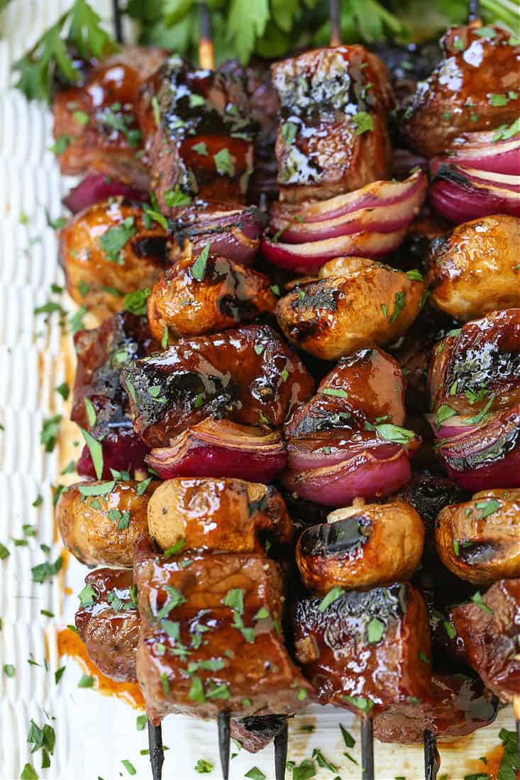 Bourbon Steak Kabobs on a white platter