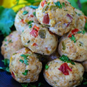 baked chicken fajita meatballs on a black plate