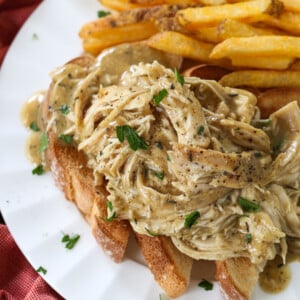 crock pot shredded chicken with gravy on toast