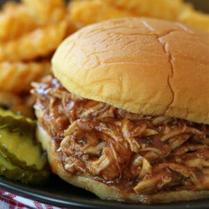 Slow cooker bbq shredded chicken on a bun