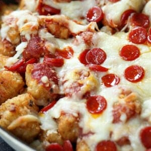 Tater tot nachos in a skillet after baking