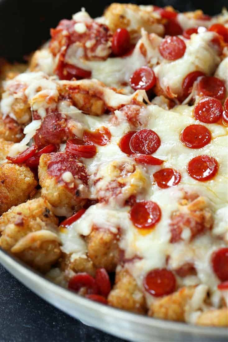 Tater tot nachos in a skillet after baking