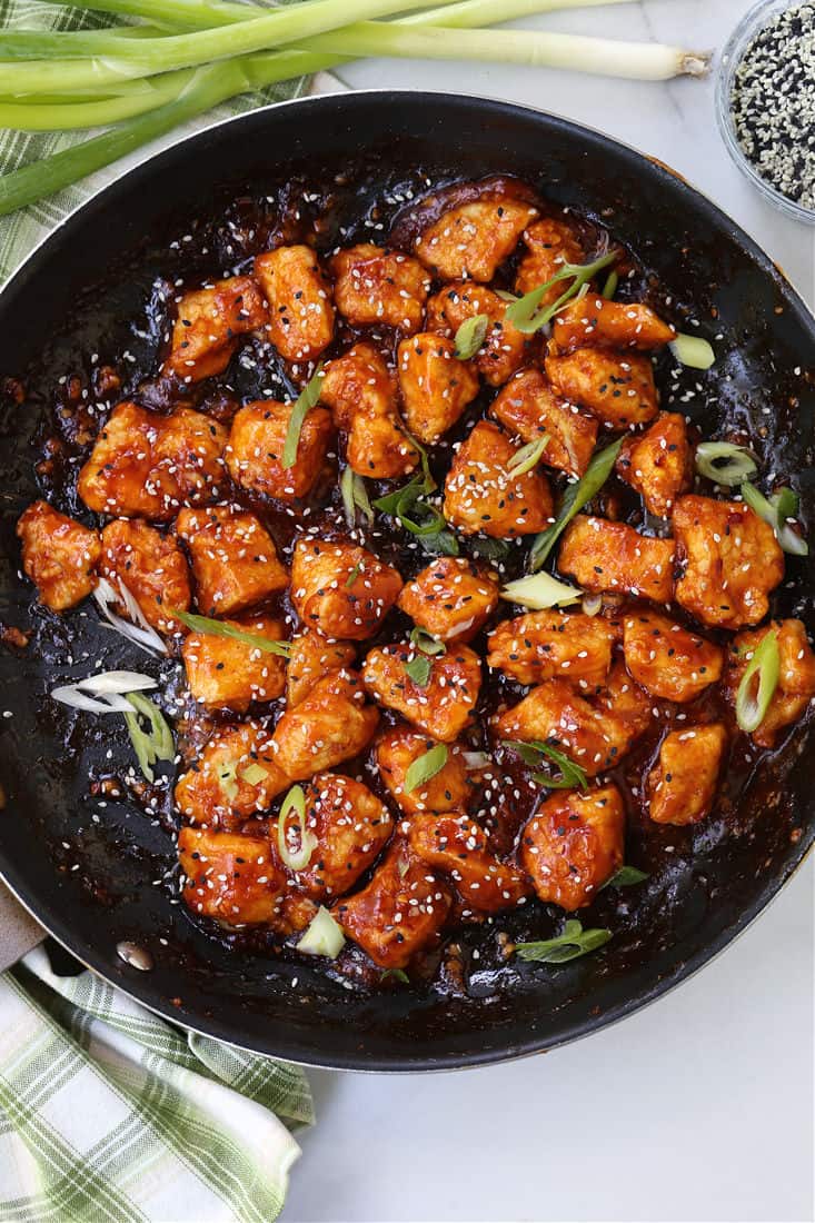 General Tso's Chicken recipe in a skillet with scallions